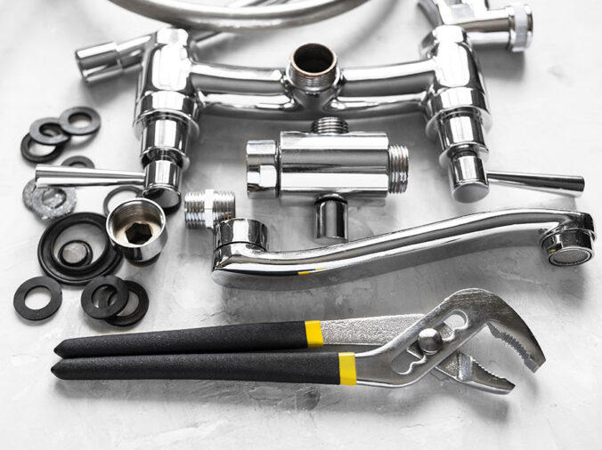 Chromew sink faucet pieces and plumbing wrench